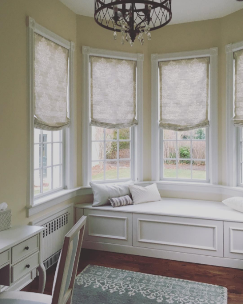 relaxed roman shades bay window