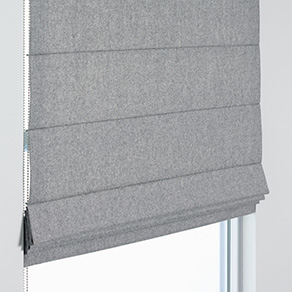 A product image of a Cascade Roman Shade shows sleek linear design for a modern look