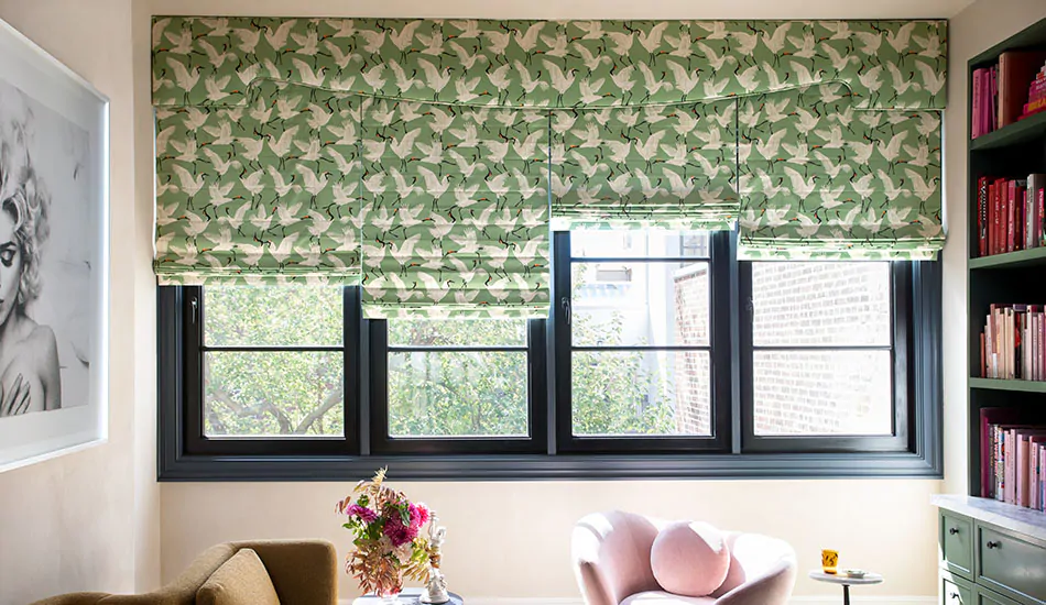 Privacy shades in a Flat Roman Shade style made of Family of Cranes in Waverly Green has blackout lining for the best privacy