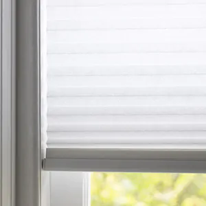 A close-up of Cellular Shades with their honeycomb design shows the difference between blinds vs shades