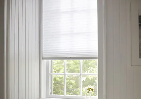 A Cellular Shade made of light filtering single cell material in Lace is used as an alternative to small window blinds