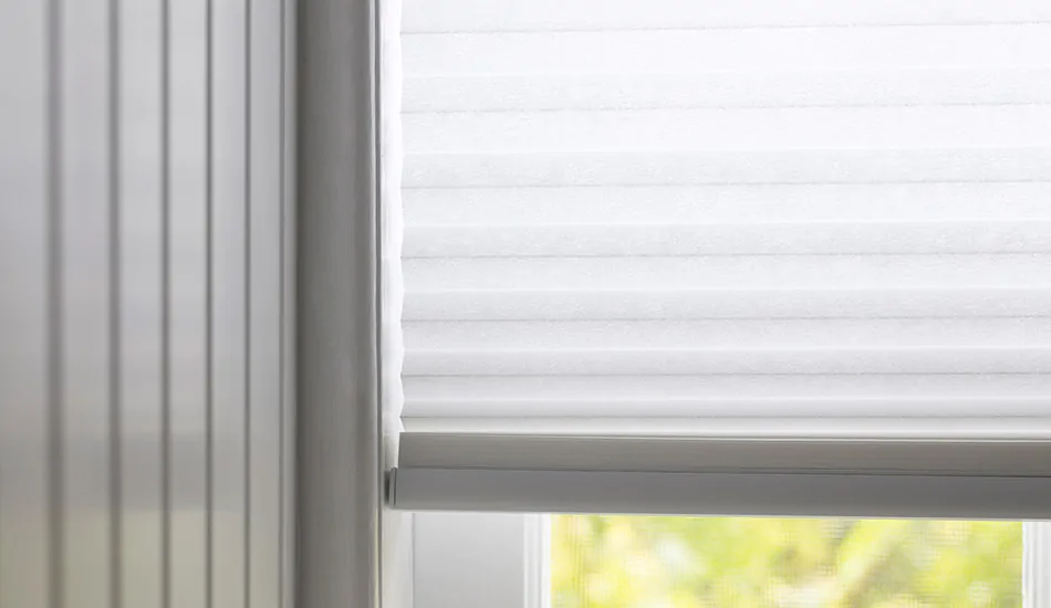 Cellular Shades made of three-quarters single cells in Lace are a great efficient alternative to blinds for bay windows