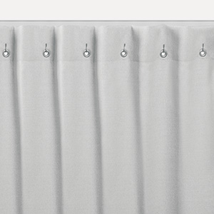 One of the types of drapes is Cubicle Drapery which features small grommets a few inches from the top
