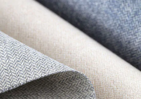 Product shot of fabric for thermal curtains, focusing on synthetic fabrics in multiple colors such as blue, white and grey