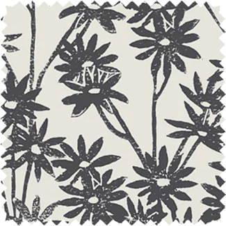 A swatch of The Novogratz Daisy Bloom in Zebra Black shows vintage-inspired floral block pattern in detail