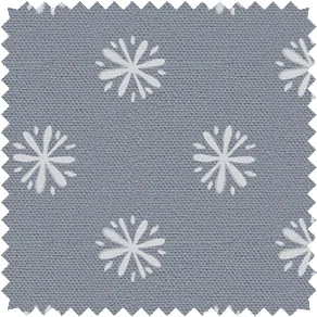 A swatch of Nate Berkus designed Gemma in Seastone Gray shows a playful starburst design perfect for nursery window treatments
