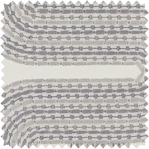 A drapery swatch made of Alexa Hampton's Cloud Chain in Grey features a beautiful embroidered pattern