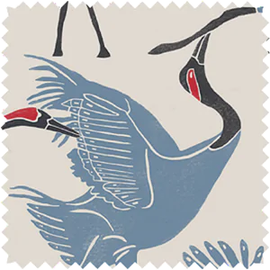 A swatch of the Novogratz Family of Cranes in Waverly Blue shows the intricate avian design