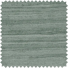 A swatch of Raw Silk in Sage features a soft, cool, grey green color with a natural, inviting, uneven texture