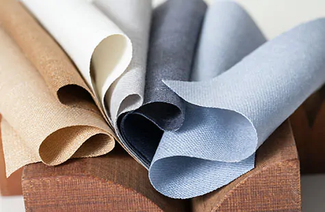 Swatches of Matka Silk in rich colors deliver a matte coloring and inviting texture to silk curtains