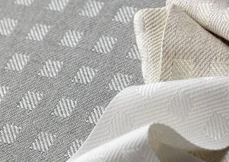 A close-up material shot of a checkered fabric for curtains that illustrates their impeccable design