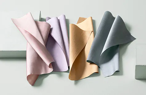 Swatches of Silk Dupioni material in lovely pastel colors deliver a subtle sheen and softness to silk curtains