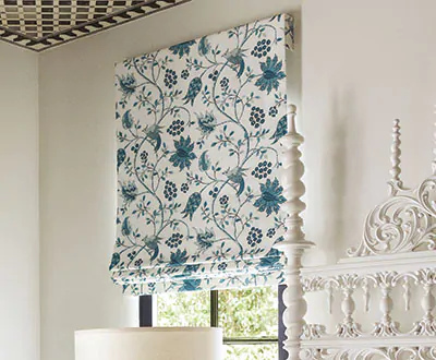 Roman shades for windows include a Flat Roman Shade made of Boho Vine in Ocean with blackout lining for room darkening