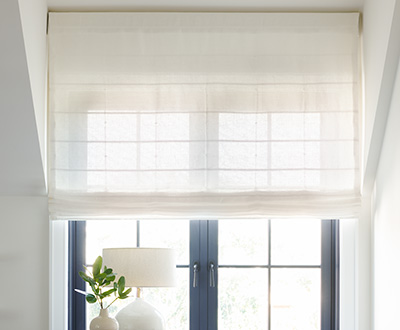 Roman shades for windows include a Flat Roman Shades made of Sankaty Stripe in Moon without lining for soft a glow