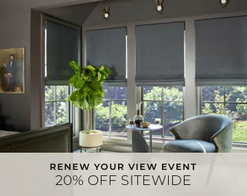 Flat Roman Shades of Wool Blend in Charcoal cover windows in a bedroom with overlaid sales messaging for 20% off sitewide