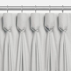 One of the types of drapes is Goblet Drapery which features delicate pinched goblet-shaped pleats for a luxe look