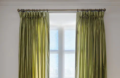 Window treatment trends 2023 include elegant drapery like the detailed feminine pleats in Goblet Drapery