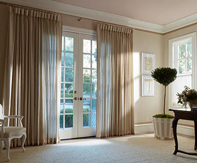 A room at the Kips Bay Dallas Showhouse in 2022 features sheer Goblet Drapery in a warm earthy brown tone