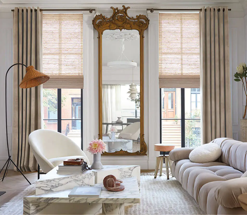 A modern glam-inspired living room features Velvet curtains in the Grommet style made of Velvet in Antique for a luxe element
