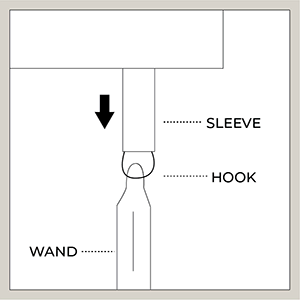 An illustration shows how to secure the wand to its hook by pulling down the sleeve over the hook so the wand can't come off