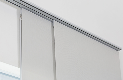 The next step for how to install vertical blinds is to re-align the track carriers into their original positions