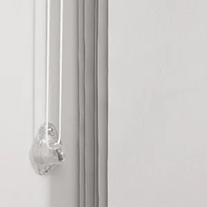 The possible next step for how to install vertical blinds is to fasten the tension device for a cord loop control system