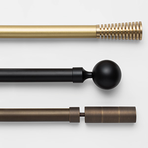 A display of Madison Hardware shows three colored rods and three types of finials all of which are modern and sleek