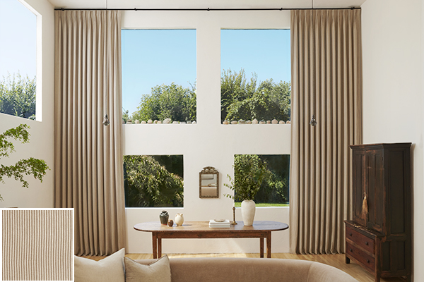 Between curtains or no curtains a living room with antique decor has Pinch Pleat Drapery of Surrey Stripe, Morel and Natural