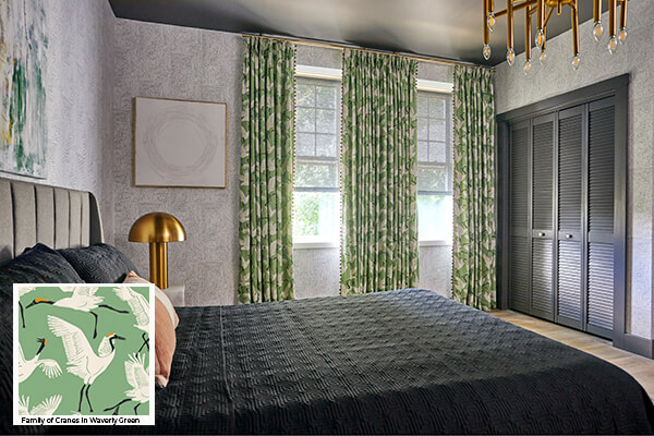 Geometric patterns, one of the window treatment trends 2024, is seen in this bedroom's drapes with a hand-drawn crane pattern