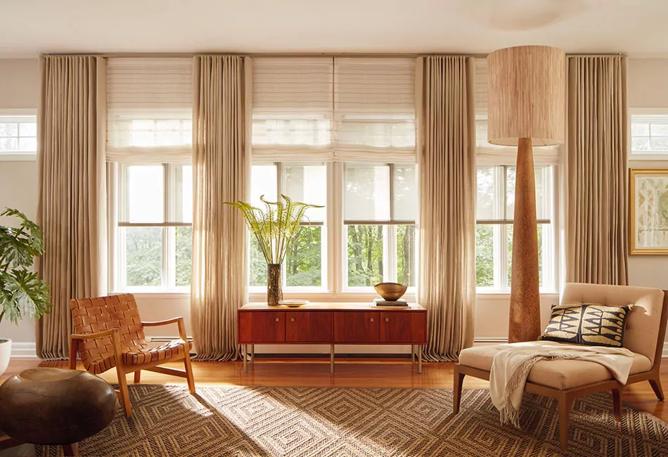 Living room curtain ideas include Linen drapes in Natural in this warm, inviting wood-toned space