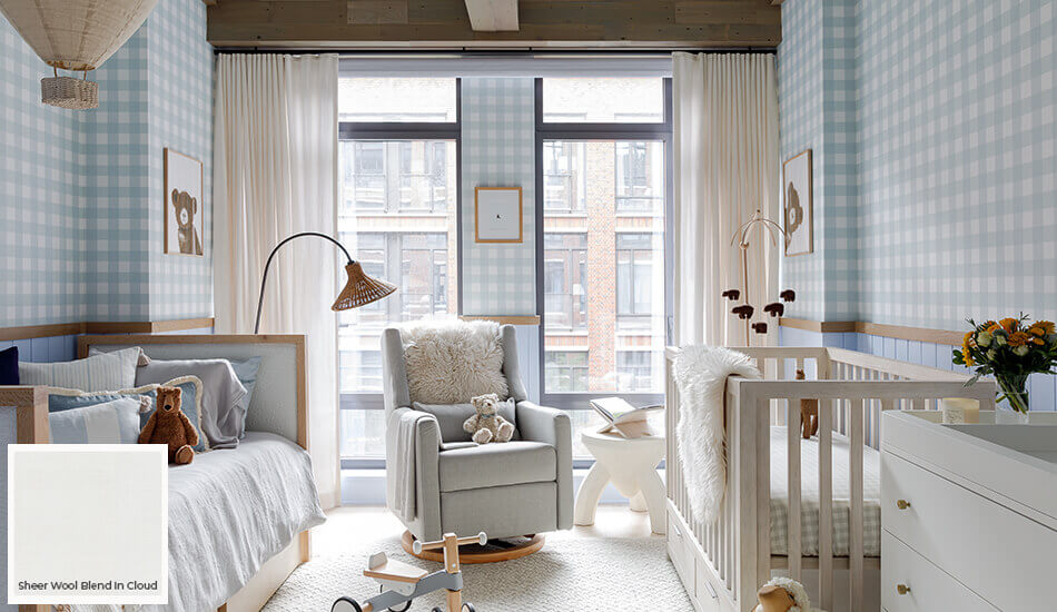 One of the window treatment trends 2024 is the use of sheer drapery seen on these Ripple Fold Drapes in a well-lit nursery