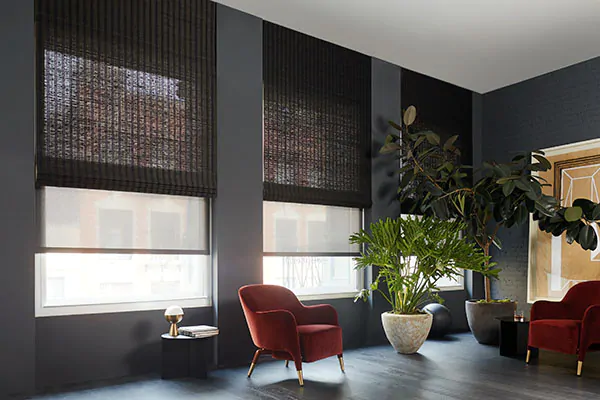 Woven Wood Shades made of Bayshore in Charcoal add natural texture to a ultra-modern space with red accents