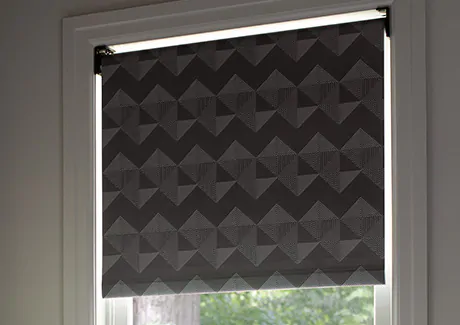Roller shades come in blackout material like Quilt in Tuxedo that blocks light and offers bathroom window privacy