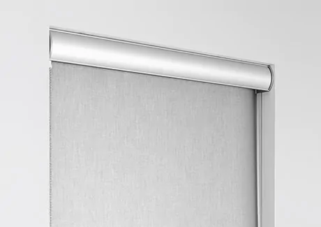 A product image of a metal valance for roller shades shows how similar a cornice vs valance can be