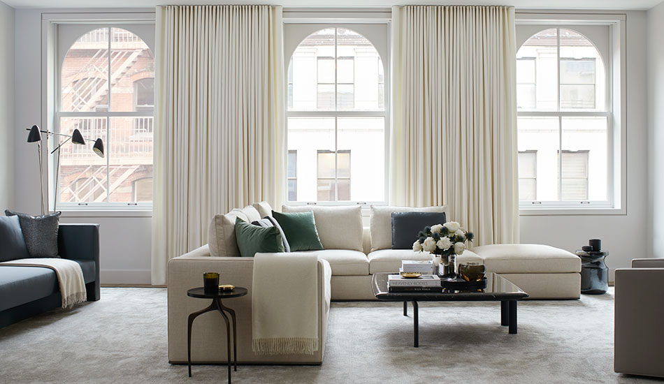 Ripple Fold Drapery in Wool Flannel, Glacier, in an upscale apartment could be called drapes vs curtains but both can be used