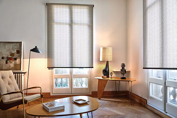 Two sets of French doors in a mid-century modern living room feature a door window shade on each made of Tea Leaves in Brown