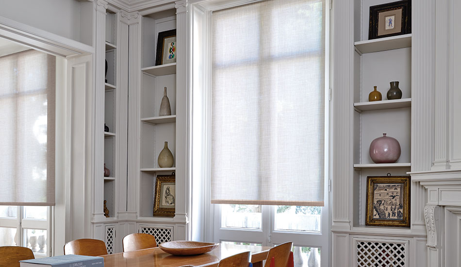 Types of blinds include Roller blinds made of Techno in Linen over French doors in a mid-century modern dining room