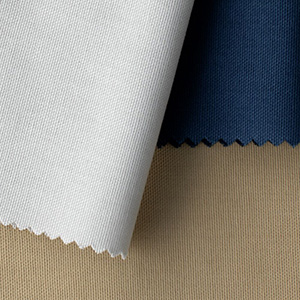 Roman Shade swatches made of Cotton fabric are laid with subtle curves on a table and feature white, blue and beige colors