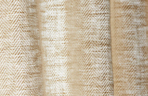 Herringbone fabric forms gentle waves and offers subtle visual texture for linen Roman Shades thanks to the micro pattern