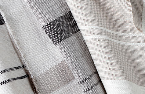 Shoreham Stripe fabric in different colors is layered together and offers a striking look for linen Roman Shades