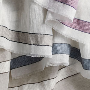 Swatches of Victoria Hagan's Harbor Stripe showcase the bold tri-colored stripe design for a dramatic look
