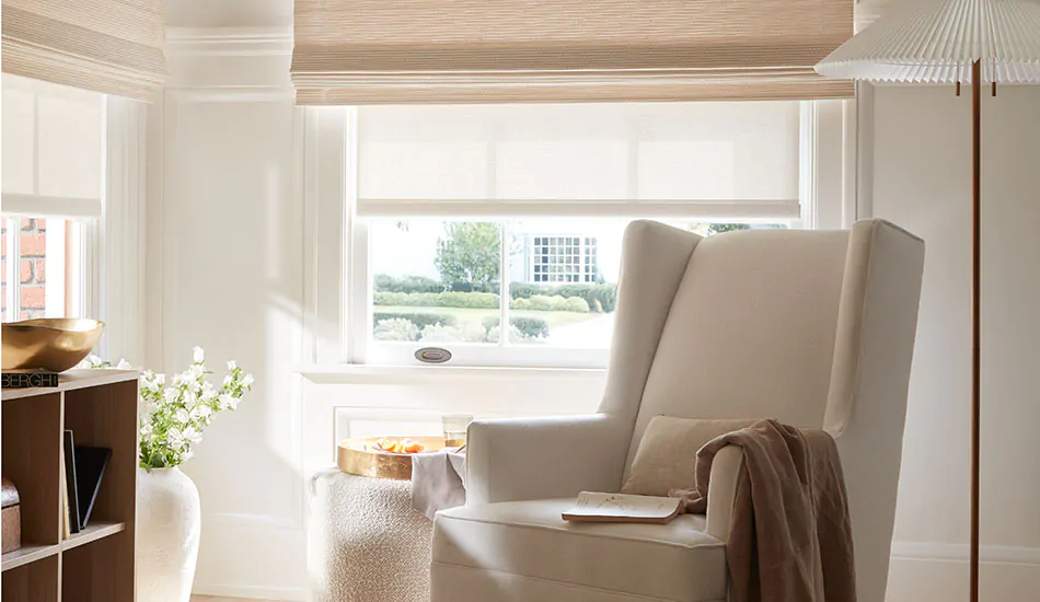 Neutral nursery window treatments include Solar Shades in 1% Solistico, Oatmeal, and Woven Wood Shades in Somerset Cloud