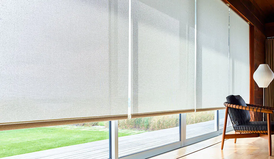 Solar Shades made of 10 % in Beige are great sunroom window treatments that cover large windows in a mid-century modern room