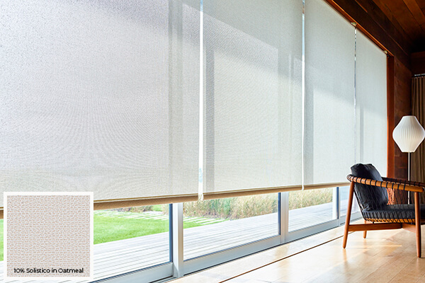 Solar Shades made with 10% Solistico in Oatmeal covering a row of large windows are one of the window treatment trends 2024