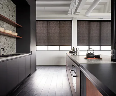 Modern window treatments for a kitchen with a dark color scheme include sleek black solar shades with 3% openness