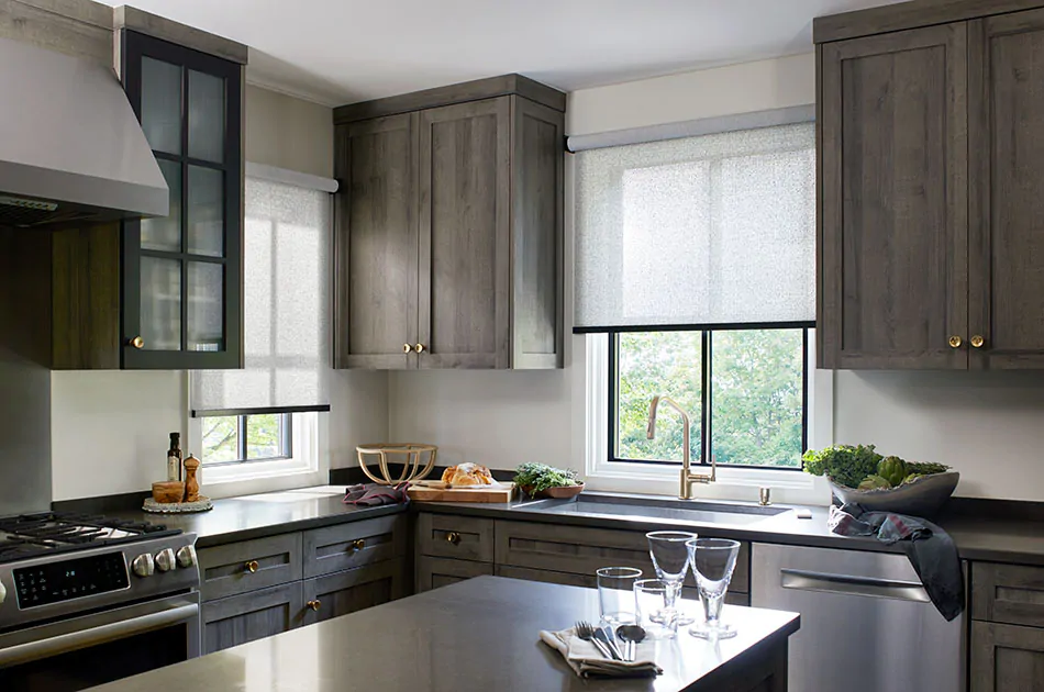 A sleek grayscale modern kitchen with light gray solar shades and 3% openness helps answer what are solar shades