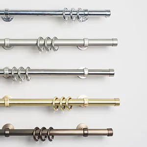 The collection of Steel Hardware for curtain rods shows several finishes some shiny and some tarnished for a worn look