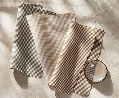 Swatches of Galley Gingham from the Studio McGee window treatments collection shows a delicate pattern