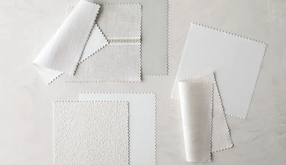 Swatches from the Most Popular material collection are laid out on a table decoratively