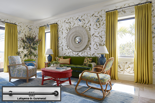 A luxe boho-inspired lounge has French return rods Lafayette in Gun Metal with Tailored Pleat Drapery in a bright yellow